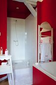 Vintage-style bathroom with red walls