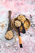 Winter emmer, einkorn and kamut on spoons