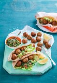 Stuffed pita pockets with falafel, hummus and salad