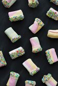 Colourful marshmallows decorated with hundreds and thousands