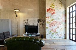 Graffiti and floral wallpaper in vintage-style living room