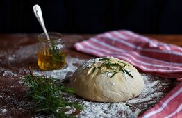 Bread dough with olive oil and rosemary