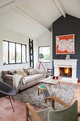 Open fireplace and vintage furniture in living room