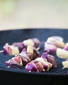 Turkey liver skewers on a barbecue