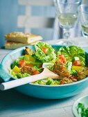 A colourful summer salad with courgette nuggets