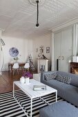 Mixture of styles and dining area in interior of period apartment