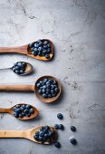 Blueberries on various spoons