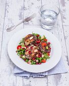 Spicy turkey and apricot burgers on a salad