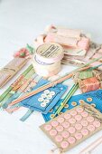 Vintage sewing utensils in pastel shades