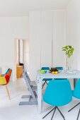 Colourful designer furniture in modern dining room