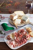 Cheese and ham platter on a Christmas dinner table