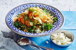 Oriental grain salad with carrots, courgettes, chickpeas and feta cheese