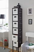 Tall, narrow chest of drawers with chalkboard sides