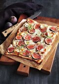 Tarte flambée with figs, goat's cheese and rosemary