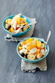 Cod salad with white beans, oranges, olives, tomatoes and croutons
