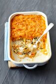 Cod and smoked fish bake with a curried potato topping