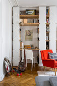 Floor-to-ceiling shelving with integrated desk