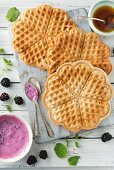 Vegan gluten-free waffles with blackberry yoghurt