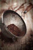 Cocoa powder in a sieve