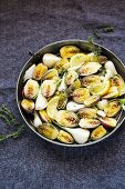 Fried baby artichokes with spring onions and lemon