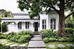 Victorian house with well-kept garden