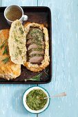 Saddle of land with pesto baked in a salt crust