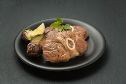 Knuckle of veal with artichokes