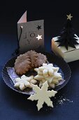 Gluten-free Christmas biscuits with a paper Christmas tree and a home-made card