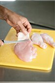 Removing the skin from chicken