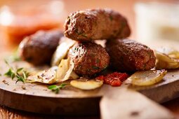 Cevapcici (grilled minced meat sausages, Balkans)