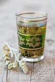 Verbena tea in an oriental tea glass