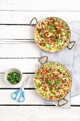 Frittatas with chanterelle mushrooms, peas and bacon