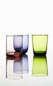 Coloured glasses by Bitossi on a reflective surface