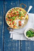 Frittata with chanterelle mushrooms, peas and bacon