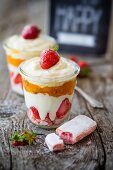 Tiramisu with strawberries and apricots and thyme compote