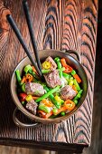 Fresh vegetables with beef and noodles (Asia)