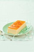 Panna cotta with orange jelly and apricots