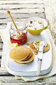 Pancakes with nut and lemon cream cheese and honey