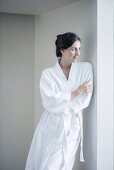 Woman relaxing in bathrobe