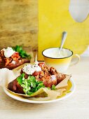 Baked sweet potatoes with chilli mince