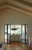View into kitchen through modern glass folding doors
