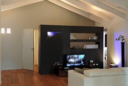 Black partition wall in attic living room
