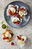 Muffin cups with poached egg, bacon and cherry tomatoes