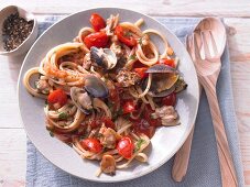 Pasta with cherry tomatoes and cockles