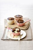 Pear and nut puddings with cinnamon and vanilla sauce
