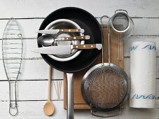 Kitchen utensils for making stuffed, grilled fish