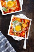 Eggs baked with vegetables and sausage