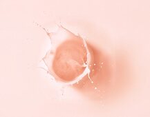 A splash of strawberry milk (close-up)