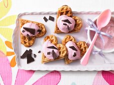 Waffle hearts with raspberry quark and chocolate leaves