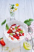 Strawberries on a bed of coconut